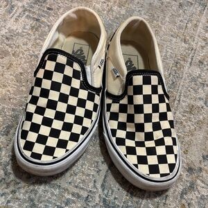 Vans Black and Cream Checkerboard Slip-On Sneakers